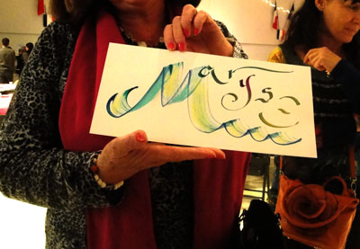 Calligraphie prénom d'une invitée lors d'une animation de soirée